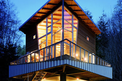 Example of a trendy metal exterior home design in Seattle