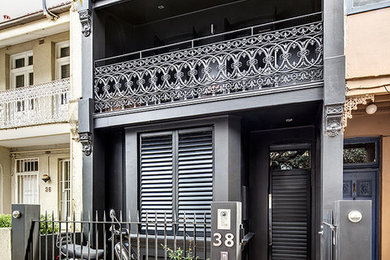 Photo of a black victorian house exterior in Sydney.