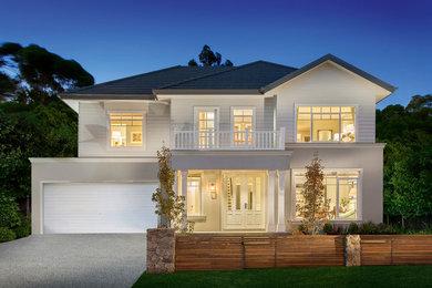 Photo of a white contemporary two floor house exterior in Melbourne.
