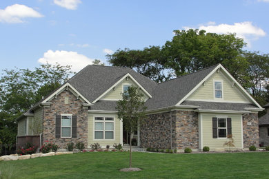 Example of a one-story concrete fiberboard exterior home design in Other