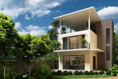 Imagen de fachada blanca minimalista de tamaño medio de tres plantas con revestimiento de hormigón
