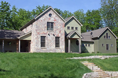 Example of a country exterior home design in St Louis