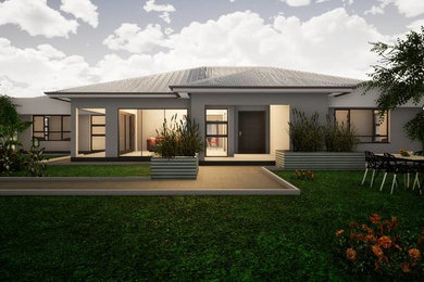 Imagen de fachada de casa gris contemporánea de tamaño medio de una planta con revestimiento de estuco, tejado a cuatro aguas y tejado de metal