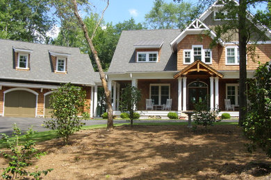 Mid-sized arts and crafts brown two-story wood gable roof photo in Atlanta