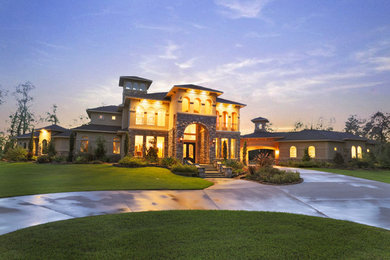 Inspiration for a timeless two-story stucco exterior home remodel in Houston