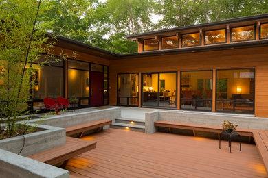 Inspiration for a modern one-story wood exterior home remodel in Raleigh