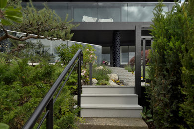Mid-sized minimalist black two-story exterior home photo