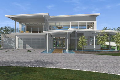 Esempio della facciata di una casa grande bianca contemporanea con tetto piano
