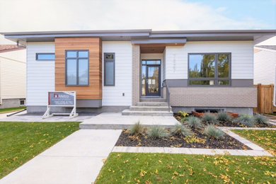 Transitional exterior home idea in Edmonton