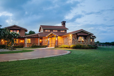 Example of a tuscan exterior home design in Other