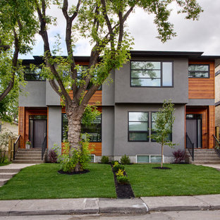 Zweistöckige, Graue Moderne Doppelhaushälfte mit Mix-Fassade in Calgary
