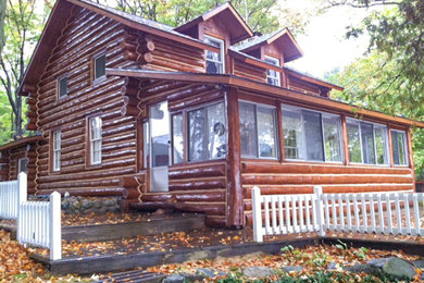 Rustic exterior home idea in Cedar Rapids