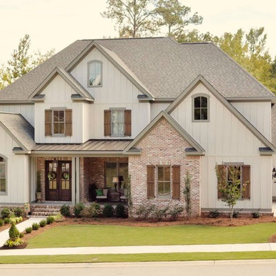 Mid-sized elegant white two-story mixed siding gable roof photo in Atlanta