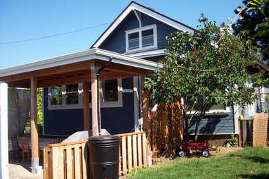 Inspiration for a small craftsman two-story wood exterior home remodel in Portland