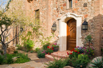 Country stone exterior home photo in Phoenix