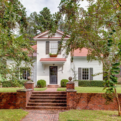 Traditional white two-story wood exterior home idea in Atlanta