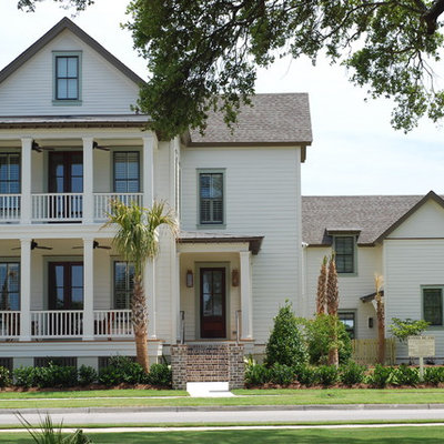 Inspiration for a timeless wood exterior home remodel in Charleston
