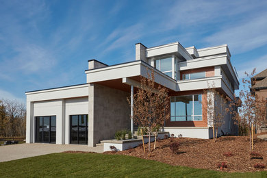 Example of a minimalist exterior home design in Edmonton