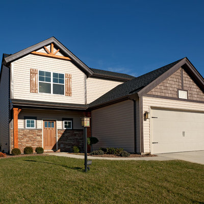 Inspiration for a mid-sized craftsman brown two-story mixed siding exterior home remodel in Other