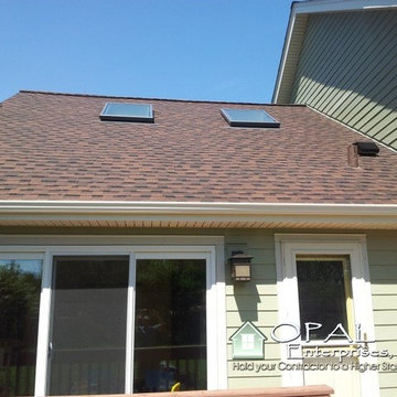 James Hardie Siding in Heathered Moss, Cobblestone Trim, & Stone in Naperville