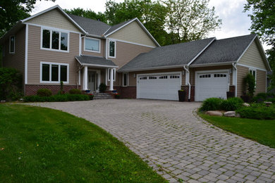 Example of an arts and crafts exterior home design in Minneapolis