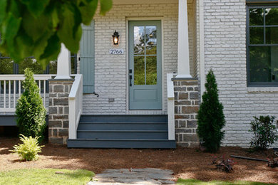 Inspiration for a large craftsman white two-story mixed siding house exterior remodel in Atlanta