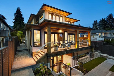 Inspiration for a mid-sized contemporary exterior home remodel in Vancouver