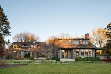 Inspiration for a large contemporary two-story wood exterior home remodel in New York