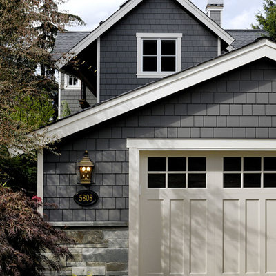 Elegant wood exterior home photo in Seattle