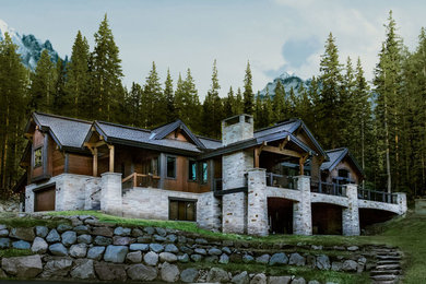 Idées déco pour une grande façade de maison marron montagne à un étage avec un revêtement mixte et un toit en appentis.