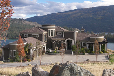 Example of a tuscan exterior home design in Vancouver