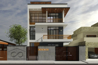 Ejemplo de fachada de casa beige contemporánea de tamaño medio de tres plantas con tejado plano