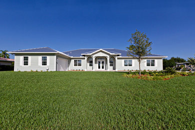 Island style exterior home photo in Miami