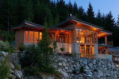 Rustic exterior home idea in Vancouver