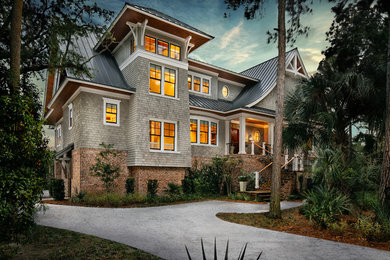 Craftsman two-story mixed siding house exterior idea in Charleston with a metal roof