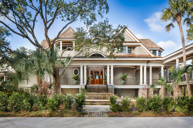 Coastal gray two-story wood exterior home idea in Charleston