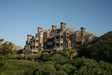 This is an example of a beach style house exterior in Charleston.