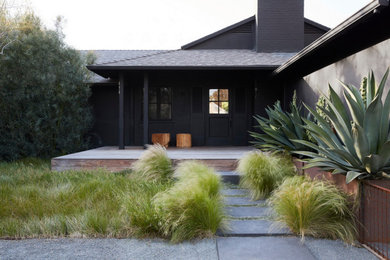 Inspiration for a black exterior home remodel in Los Angeles