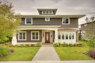 Inspiration for a craftsman two-story wood exterior home remodel in Seattle