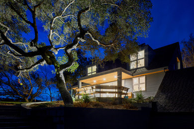 Example of a large danish gray two-story concrete fiberboard exterior home design in San Luis Obispo with a shingle roof