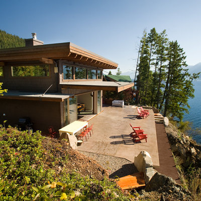 Mid-sized trendy brown two-story wood exterior home photo in Vancouver