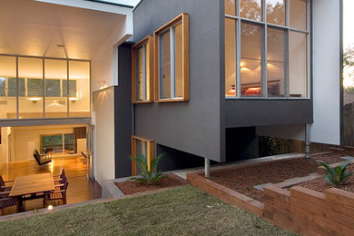 Design ideas for a contemporary house exterior in Brisbane.