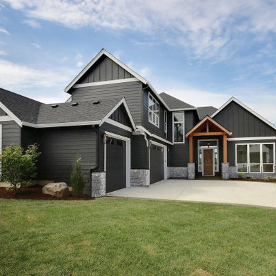 Inspiration for a huge craftsman gray two-story mixed siding exterior home remodel in Portland with a mixed material roof