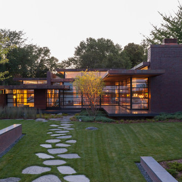 Lac La Belle - Modern Brick Lake Home with Dock and Boathouse