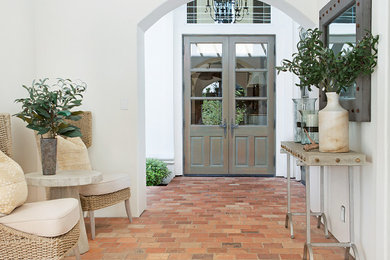 Example of a french country exterior home design in Orange County