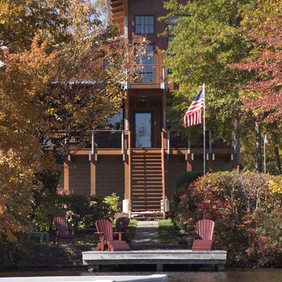 Inspiration for a contemporary wood exterior home remodel in Other