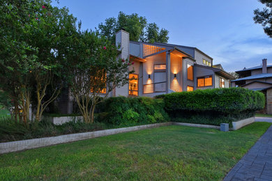 Example of a large minimalist exterior home design in Austin