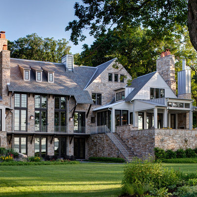 Traditional stone exterior home idea in Chicago
