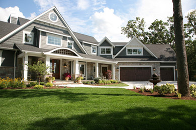 Inspiration for a timeless gray exterior home remodel in Milwaukee