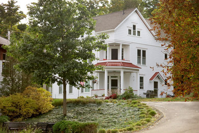 Example of an eclectic exterior home design in Other